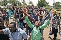  ?? ASSOCIATED PRESS PHOTO ?? Sudanese protesters celebrate following a signing ceremony Sunday in the capital Khartoum, Sudan.