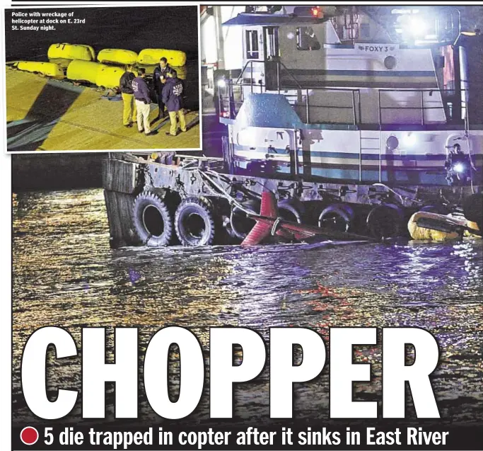  ??  ?? Police with wreckage of helicopter at dock on E. 23rd St. Sunday night.