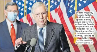  ?? Picture: Nicholas Kamm/Pool via AP ?? Senate Majority Leader Mitch McConnell speaks during a news conference with other Senate Republican­s on Capitol Hill in Washington. Sen. John Barrasso, R-Wyo., listens at left.