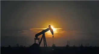  ??  ?? An oil rig at sunset in Midland, Texas. In the first six months of this year, more than 1,000 people working or applying for jobs in the oil-producing business failed urine-based drug tests, double the pace of failures last year, according to...