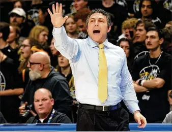  ?? MATT FREED/AP ?? Georgia Tech coach Josh Pastner calls out to his team during the first half of a game last week in Pittsburgh. The Panthers won 76-68. “I just think it’s important for us to keep getting better,” he says.