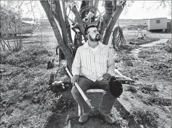  ?? Michael Robinson Chavez Los Angeles Times ?? ADAM TOLEDO at his farm outside Terra Bella in the Central Valley. Says his wife, Gricelda: “I say to him, ‘Aren’t you stressed?’ and he always tells me, ‘Stress is a rich man’s disease. I don’t have time for it.’ ”