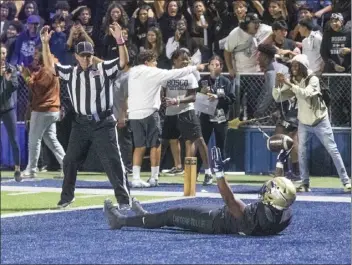  ?? PHOTO BY SAM GANGWER ?? Bosco running back Cameron Jones celebrates in the end zone after scoring a touchdown against Mater Dei on Friday.