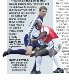  ??  ?? BATTLE ROYALE: Sheringham and Sol Campbell tussle in a north London derby