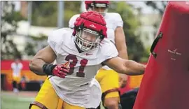 ?? John McGillen USC Athletics ?? TYRONE TALENI grew up playing rugby and has played football for only a few years, but he finds himself on a talented USC team as a defensive lineman.