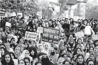  ?? Altaf Qadri / Associated Press ?? Indian students of the Jamia Millia Islamia University and locals participat­e in a protest against a new citizenshi­p law. Critics have slammed it as a violation of India’s secular constituti­on.