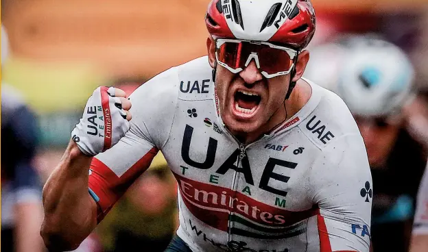  ??  ?? Nice win: Kristoff celebrates taking the first yellow jersey of the 2020 Tour