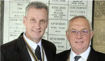  ?? Picture: UVIWE JARA ?? BIG VISION: Ken Clark, right, the newly elected president of the Queen’s College Old Boys Associatio­n, with outgoing president Allister Van Schoor after the school’s moving memorial service on Sunday.