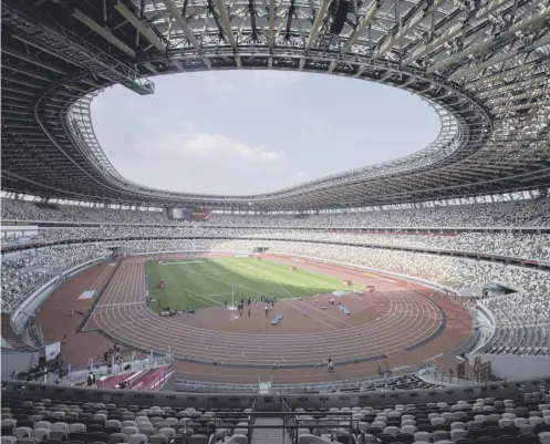  ??  ?? 0 Tokyo's National Stadium hosts the Olympics’ opening ceremony on July 23 but only a limited number of VIPS may be able to attend