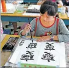  ?? WANG BIAO / FOR CHINA DAILY ?? Calligraph­y is among the most popular tuition courses in China. Others include Go, dancing and English.