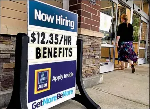  ?? AP ?? A store in Salem, N.H., is among many companies nationwide seeking to hire as U.S. job openings continue to rise, the Labor Department said Tuesday.
