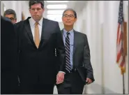  ?? AP/PABLO MARTINEZ MONSIVAIS ?? Bruce Ohr (rear, right), a Justice Department lawyer, arrives Tuesday for an interview with the House Judiciary and Oversight committees on Capitol Hill.