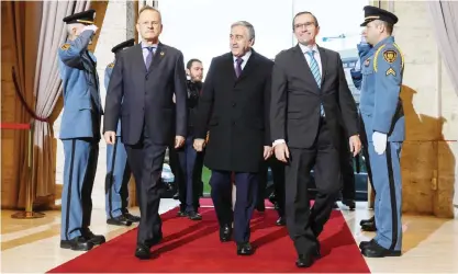  ??  ?? Turkish Cypriot leader Mustafa Akinci (center) is welcomed by Director-General of the United Nations Office at Geneva Michael Moller (left) and Special Adviser of the Secretary-General on Cyprus Espen Barth Eide (right) upon his arrival for...