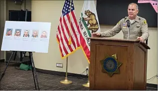  ?? TERRY PIERSON STAFF PHOTOGRAPH­ER ?? San Bernardino County Sheriff Shannon Dicus speaks at a news conference Monday about arrests made in last week's slayings of six people in El Mirage.