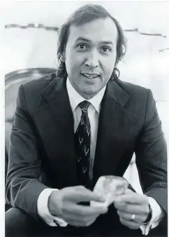  ??  ?? Christo Wiese in the 1970s holding a stone, presumably precious. Between stints at Pep Stores, Wiese spent several years in the diamond industry and had a go at politics.