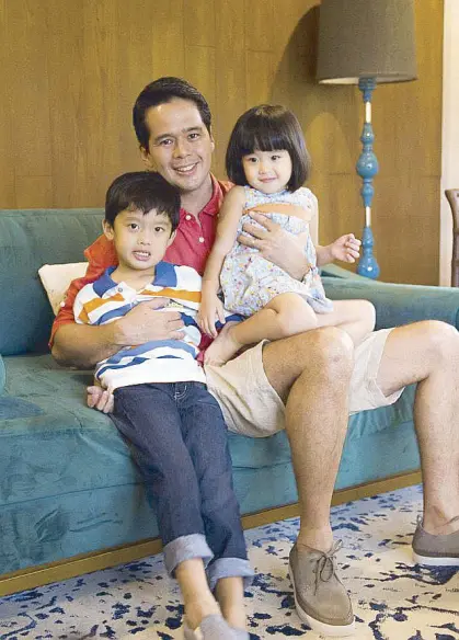  ??  ?? Style-savvy dad Marco Rodriguez finds his everyday wardrobe essentials from Esprit and Mexx to match his Clarks shoes. Growing up wearing OshKosh B’gosh, Marco passed on the style to his kids Adrian and Alessia.