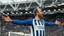  ?? GETTY IMAGES ?? Brighton striker Glenn Murray celebrates after scoring a goal against West Ham in February before the Premier League season was halted.