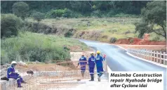  ??  ?? Masimba Constructi­on repair Nyahode bridge after Cyclone Idai