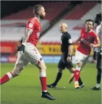  ??  ?? MAD FOR IT Charlton’s Marcus Maddison celebrates scoring