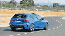  ??  ?? Top: The new 1 Series adopts the enlarged kidney grille that’s finding its way onto ever more BMW snouts. Above: The new 1 Series is built on the same platform as the Mini Countryman and BMW X1, and is available in front- or all-wheel drive. Left: The digital instrument panel mimics the kidney grille.