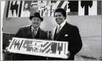  ?? BILLY DOWNS / ATLANTA JOURNAL-CONSTITUTI­ON ?? Artist Romare Bearden (left) poses in 1976 with then-Atlanta Mayor Maynard Jackson in front of the Kutz Building mural Bearden designed.