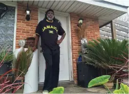  ?? PICTURE: AP ?? MAKE YOURSELF AT HOME: Baba Ken Amen, an artist and vegan caterer, poses for a photo at his home in Pontchartr­ain Park in New Orleans. Amen makes ends meet renting his solar-powered home on Airbnb.