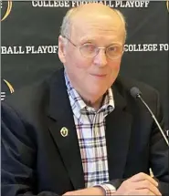  ?? ASSOCIATED PRESS FILE PHOTO ?? College Football Playoff Executive Director Bill Hancock has announced that teams unable to participat­e in the CFB semifinals Dec. 31 due to COVID-19 will forfeit the game.