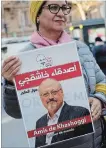  ?? FRANCOIS MORI THE ASSOCIATED PRESS ?? An activist holds a portrait reading "Friends of Khashoggi around the world" as part of a protest.