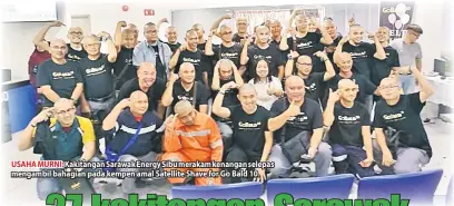  ??  ?? USAHA MURNI: Kakitangan Sarawak Energy Sibu merakam kenangan selepas mengambil bahagian pada kempen amal Satellite Shave for Go Bald 10.