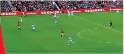  ?? BT SPORT ?? Controvers­ial call: Rashford is clearly in an offside position but is deemed not to be interferin­g with play, before Fernandes runs through to score