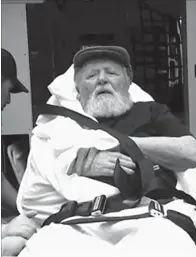  ?? Associated Press ?? ■ In this image taken from video, Jakiw Palij, a former Nazi concentrat­ion camp guard, is carried Monday on a stretcher from his home into a waiting ambulance in the Queens borough of New York. Palij, the last Nazi war crimes suspect facing deportatio­n from the U.S., was spirited early Tuesday morning to Germany, the White House said.