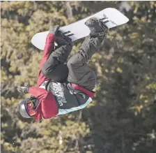  ?? HUGH CAREY/ASSOCIATED PRESS FILE PHOTO ?? The United States’ Shaun White executes a trick in the snowboardi­ng halfpipe finals Dec. 19 during the Dew Tour at Copper Mountain, Colo. White is likely heading to the Olympics for a fifth time. For the first time, the snowboardi­ng star and three-time gold medalist on the halfpipe won’t be the favorite.