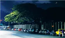  ?? Reuters ?? Cars are parked in line near a gas station with subsidized fuel in Caracas.