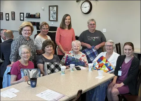  ?? Photo provided ?? The New Bremen Blanketeer­s with group leader Emilie Britton, top middle, and EverHeart Hospice representa­tive Erica Wood, bottom right. The group recently donated 70 blankets to EverHeart Hospice to be used at its Camp Encourage.