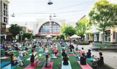  ?? New York Times ?? A yoga class at Avalon, a mixed-use developmen­t in Atlanta, Georgia. As mixed-use developmen­ts become destinatio­ns for leisure and business travellers, they are likewise becoming a preferred destinatio­n for hotel investors.