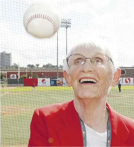  ?? RICK MACWILLIAM/FILES ?? Betty Carveth Dunn earned a staggering $75 a week the season she played with the All-American Girls Profession­al Baseball League in 1945. She still had her eye on the ball at Telus Field back in August of 2012 for a CanadaAust­ralia baseball game.