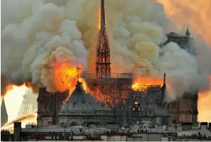  ?? ?? Inferno: Devastatin­g flames rip through Notre-Dame in April, 2019