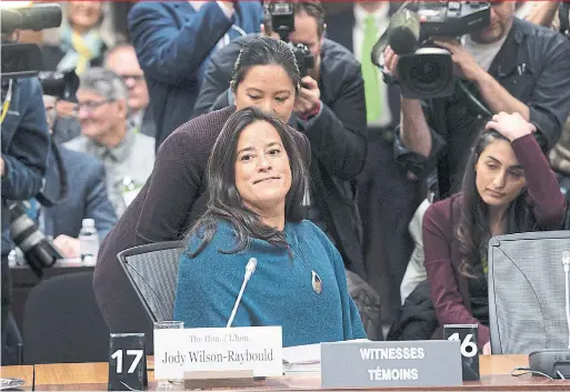  ?? ADRIAN WYLD THE CANADIAN PRESS ?? Cameras follow former attorney general Jody Wilson-Raybould before her appearance in front of the Commons justice committee in Ottawa.