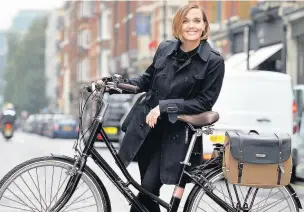  ??  ?? ●● Victoria Pendleton with one of her bikes