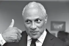  ?? Associated Press ?? ■ In this Sept. 7 photo, Mike Espy, a Democrat and former President Bill Clinton's first agricultur­e secretary, gives a thumbs up sign of approval at the Jackson, Miss., opening of his campaign headquarte­rs.