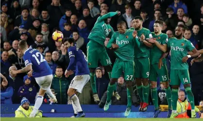  ??  ?? Lucas Digne (left) scores Everton’s injury-time equaliser against Watford. Photograph: Andrew Yates/Reuters