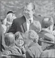  ?? | RICH HEIN~SUN-TIMES ?? Tom Boerwinkle (middle) at the 2009 funeral of Johnny “Red” Kerr.