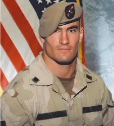  ?? CITIZEN NEWS SERVICE FILE PHOTO ?? Cpl. Pat Tillman is seen in a this 2003 file photo. He was serving in the 75th Ranger Regiment when he was killed in Afghanista­n on April 22, 2004, by friendly fire. Tillman turned down an NFL contract with the Arizona Cardinals to join the military after the Sept. 11, 2001 terrorist attacks.