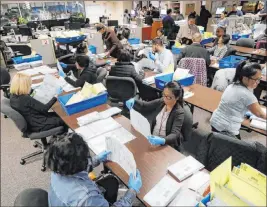  ?? The Associated Press file ?? Over 100,000 mail-in ballots were rejected by election officials in California’s presidenti­al primary, underscori­ng issues in the effort to ensure every vote is counted.