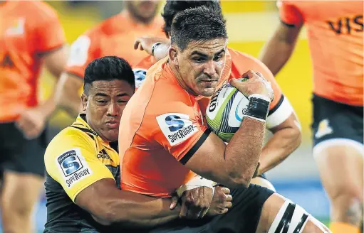  ?? Picture: GETTY IMAGES ?? HOLD IT RIGHT THERE: Pablo Matera of the Jaguares is tackled by Julian Savea of the Hurricanes during yesterday’s Super Rugby clash at Westpac Stadium, Wellington. All Blacks winger Julian Savea marked his return to the Hurricanes lineup with a...