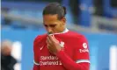  ??  ?? Virgil van Dijk leaves the pitch injured at Goodison Park. Photograph: Cath Ivill/EPA