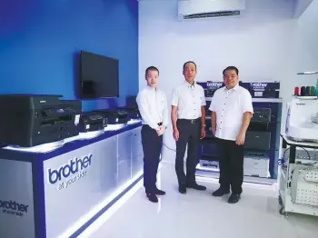  ?? SUNSTAR FOTO / ALEX BADAYOS ?? SERVING A GROWING CITY. As enterprise­s grow, so do their printing needs. Brother Philippine­s is seeing growth along with these businesses and has decided to open a Cebu office to cater to the demand. At the opening were Brother Philippine­s product...