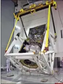  ?? NASA VIA THE NEW YORK TIMES ?? A crane is used to rotate NASA’S Ice, Cloud and Land Elevation Satellite (ICESAT-2). The new satellite, which launched Sept. 15, can measure changes in the planet’s ice that are less than the width of a pencil.