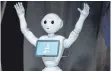  ?? FOTO: AFP ?? Durch Roboter, wie dem humanoiden Pepper, werden im Zuge der Digitalisi­erung laut einer Studie mehr Jobs entstehen als wegfallen.