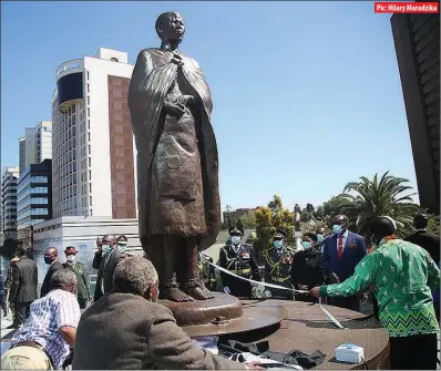  ?? Pic: Hilary Maradzika ?? President Emmerson Mnangagwa (right) cuts the ribbon at the unveiling of spirit medium Mbuya Nehanda’s statue in central Harare yesterday